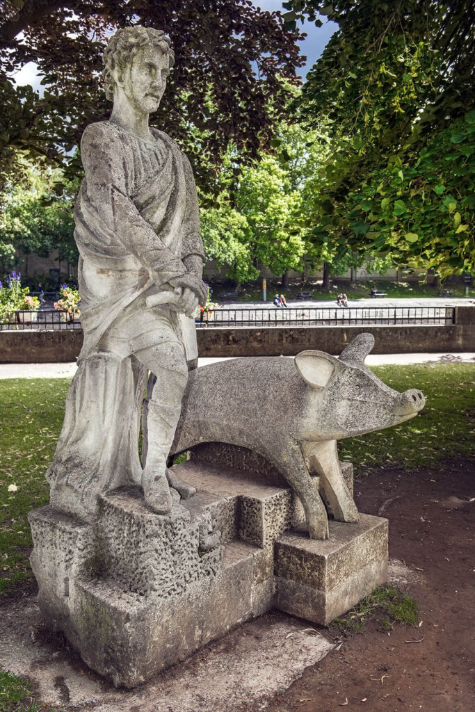 Statue of King Bladud and a pig, who founded Bath. The Grand Eastern Indian Restaurant, Bath